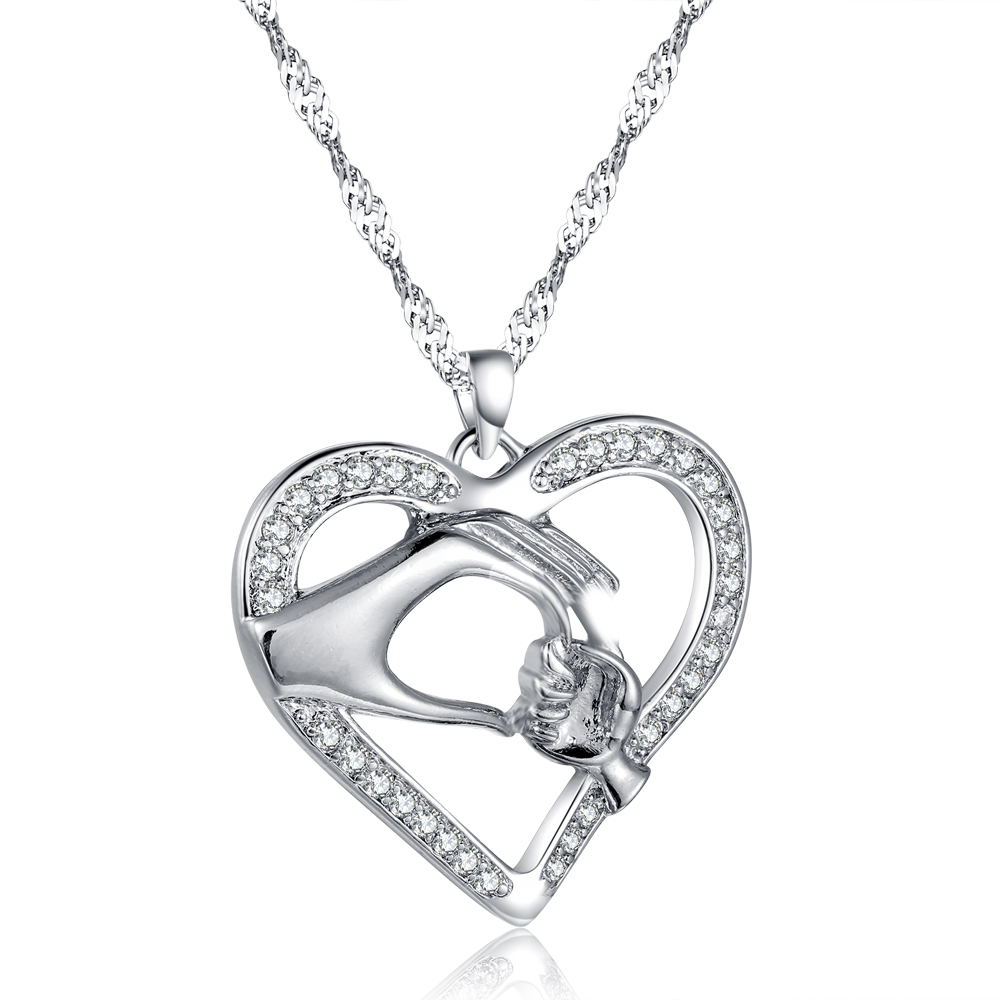Hand holding heart necklace deals